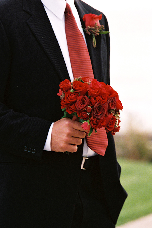 red rose wedding bouquet photo by Yvette Roman Photography